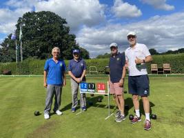Martin & Tim on the right of the scoreboard, the Storrington & Pulborough Team on the left.